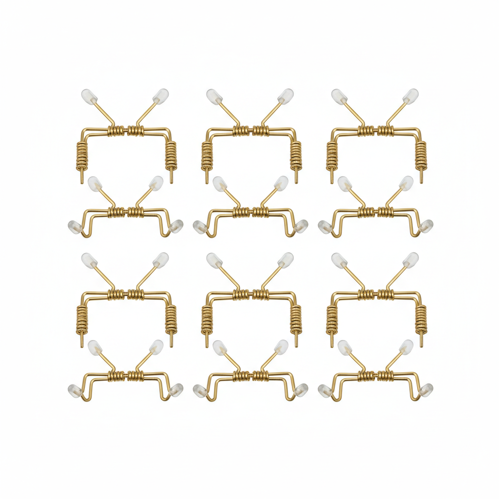 Set of 10 gold metal plate hangers flat lay top view with hooks and rubber tips