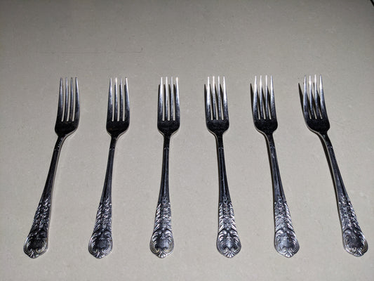 Top-down clear view of the 6-piece vintage silver-plated collectible fork set